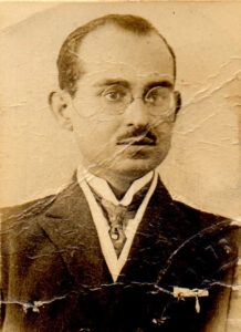 Photo d'Ahmed Tewfik el Madani sur un passeport ancien de